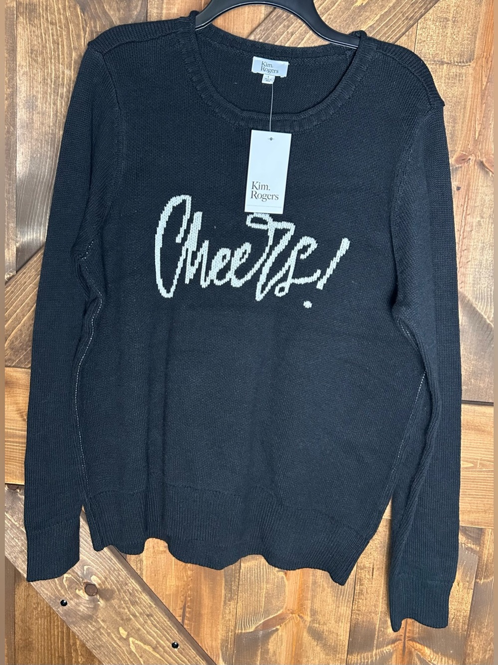 Kim Rogers Black Sweater with White 'Cheers!' Script